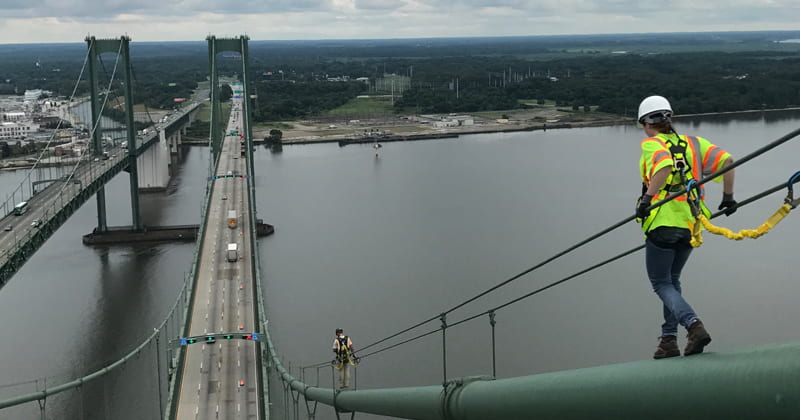 Natalie Teichman on the cables that hold up the Delaware Memorial Bridge